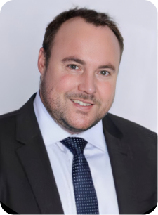 staff headshot of Peter Gibson
